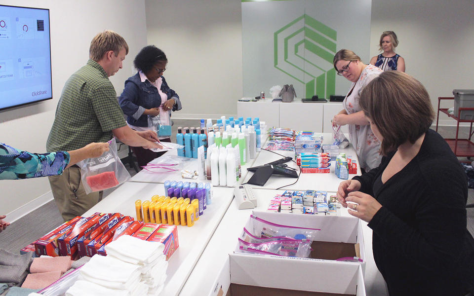 Packing personal care kits for United Way